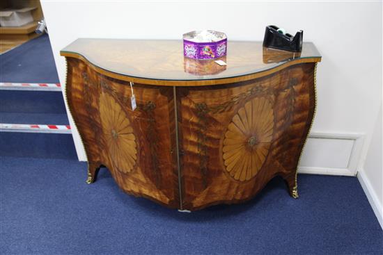 A George III style satinwood and marquetry serpentine commode, in the style of John Cobb, W.4ft 6.5in.